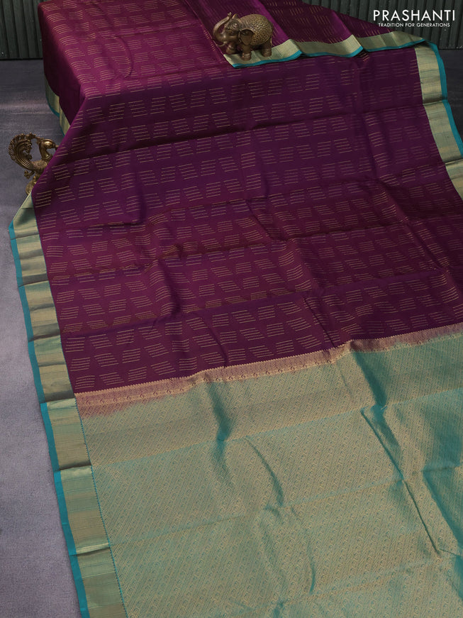 Pure kanchipuram silk saree deep purple and teal green with allover zari weaves and zari woven border