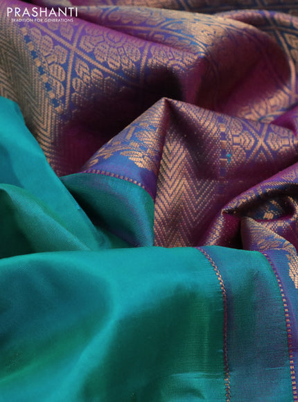 Pure kanchipuram silk saree dual shade of teal green and dual shade of purple with zari woven buttas and rich zari woven border