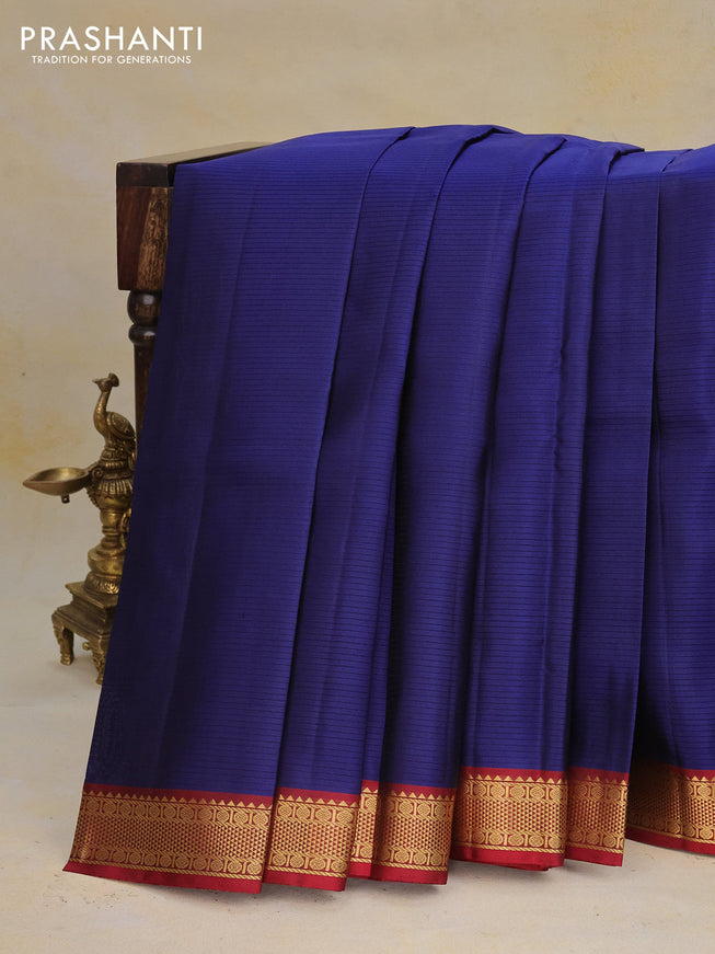 Pure kanchipuram silk saree dark blue and maroon with allover stripe pattern and zari woven border