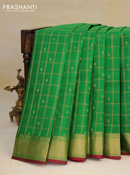 Pure kanchipuram silk saree green and maroon with allover zari checks & buttas and zari woven border