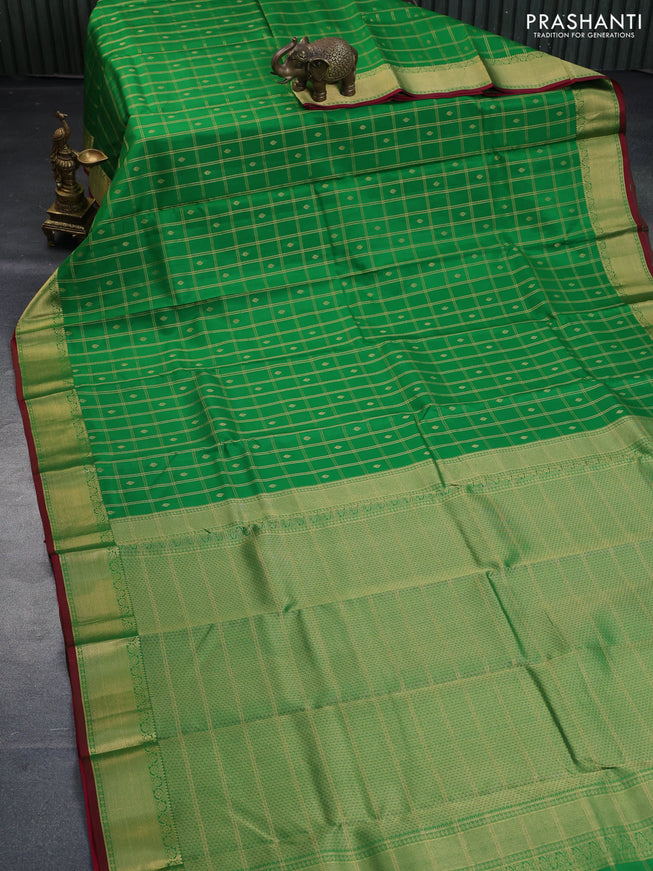 Pure kanchipuram silk saree green and maroon with allover zari checks & buttas and zari woven border