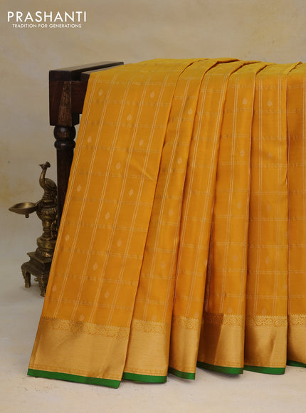 Pure kanchipuram silk saree yellow and green with allover zari checks & buttas and zari woven border