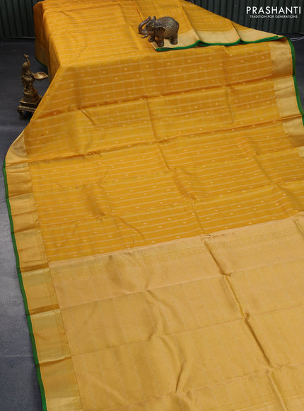 Pure kanchipuram silk saree yellow and green with allover zari checks & buttas and zari woven border