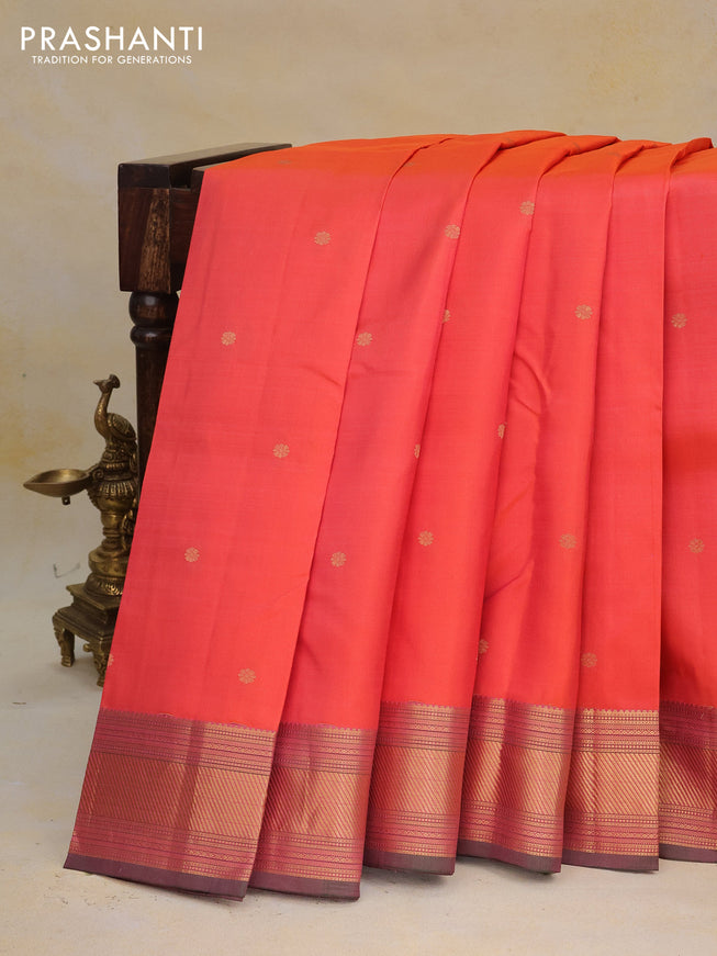 Pure kanchipuram silk saree dual shade of pinkish orange and dual shade of green with zari woven buttas and zari woven border