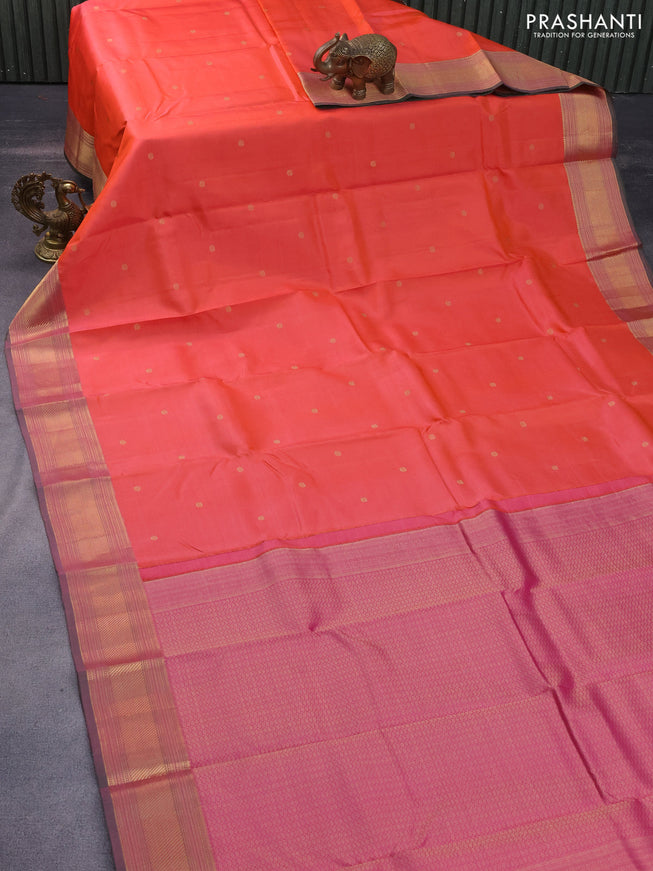 Pure kanchipuram silk saree dual shade of pinkish orange and dual shade of green with zari woven buttas and zari woven border