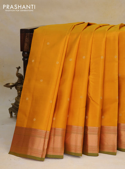 Pure kanchipuram silk saree mustard yellow and green with zari woven buttas and zari woven border