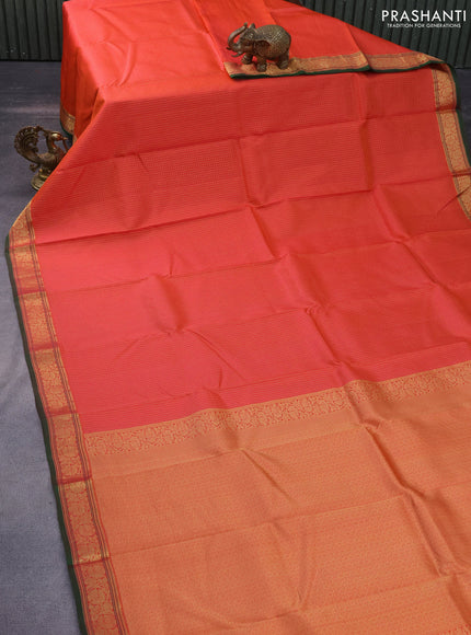 Pure kanchipuram silk saree orange and green with allover small zari checked pattern and zari woven border