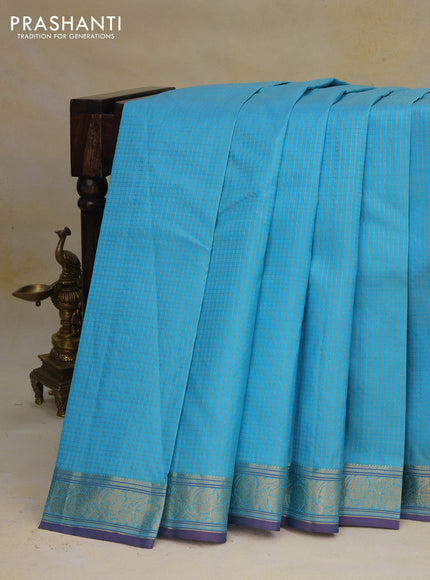 Pure kanchipuram silk saree light blue with allover small zari checked pattern and zari woven border