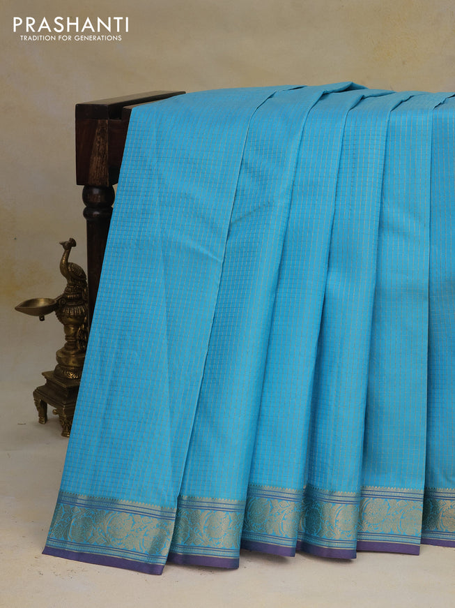 Pure kanchipuram silk saree light blue with allover small zari checked pattern and zari woven border