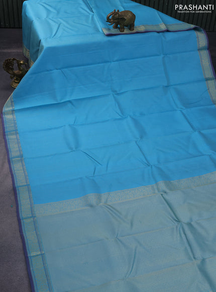 Pure kanchipuram silk saree light blue with allover small zari checked pattern and zari woven border