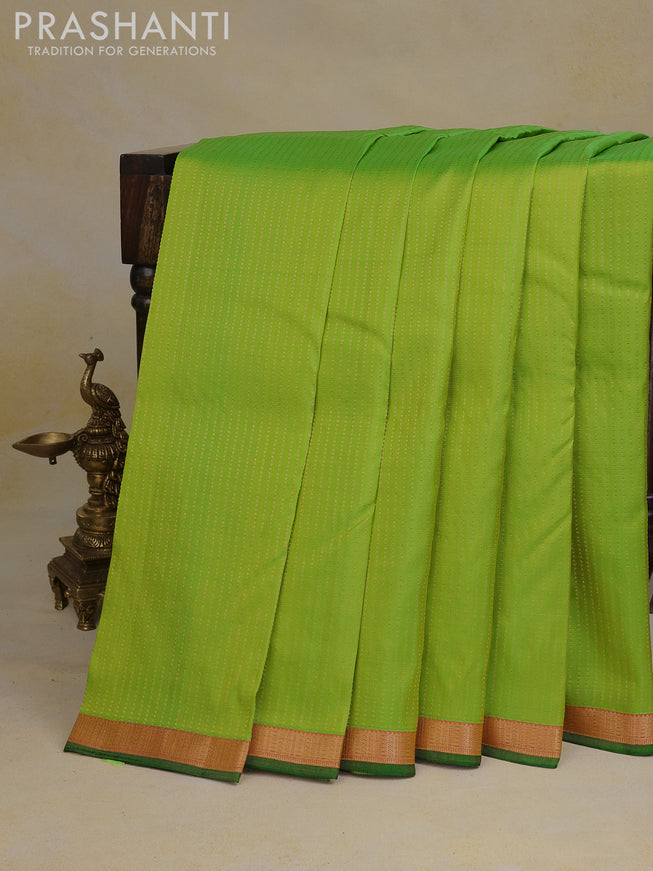 Pure kanchipuram silk saree light green and pink with allover zari weaves and zari woven border