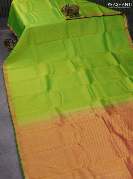 Pure kanchipuram silk saree light green and pink with allover zari weaves and zari woven border