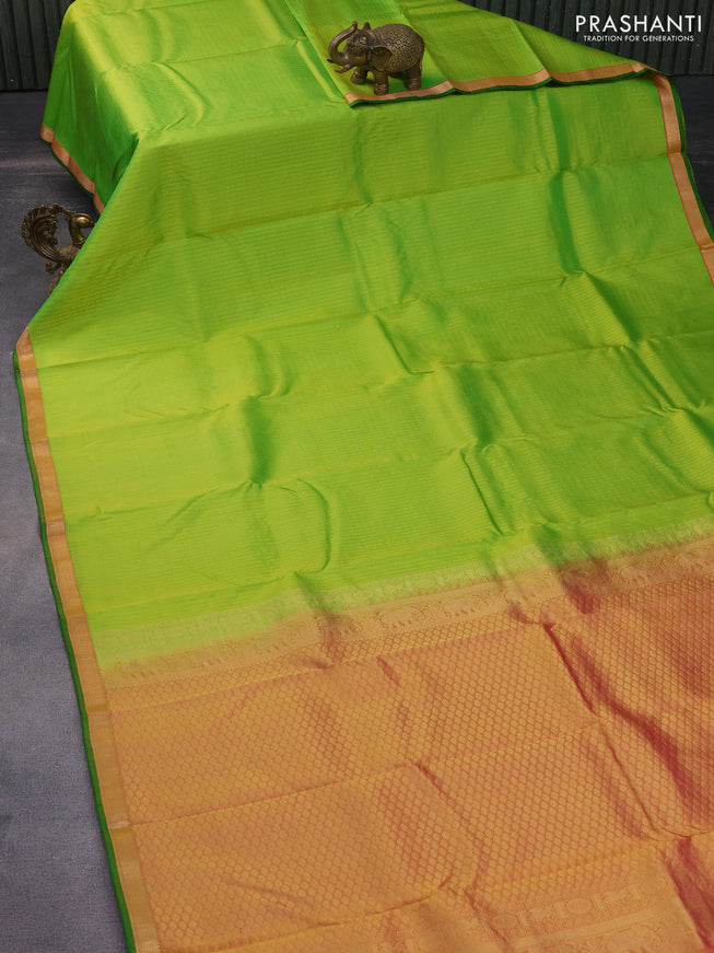 Pure kanchipuram silk saree light green and pink with allover zari weaves and zari woven border