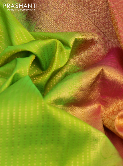 Pure kanchipuram silk saree light green and pink with allover zari weaves and zari woven border