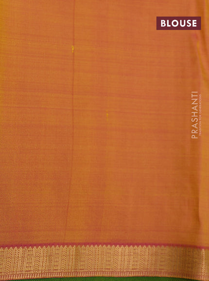 Pure kanchipuram silk saree light green and pink with allover zari weaves and zari woven border