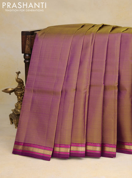 Pure kanchipuram silk saree dual shade of sap green and purple with allover stripes pattern and zari woven border