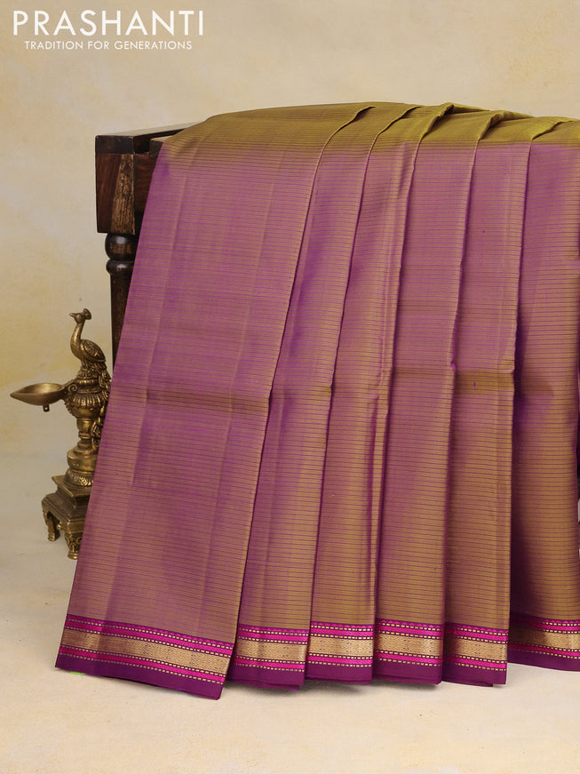 Pure kanchipuram silk saree dual shade of sap green and purple with allover stripes pattern and zari woven border