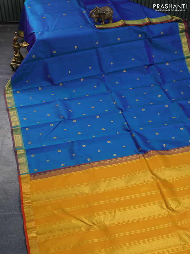 Pure kanchipuram silk saree dual shade of bluish green and red with zari woven buttas and zari woven border