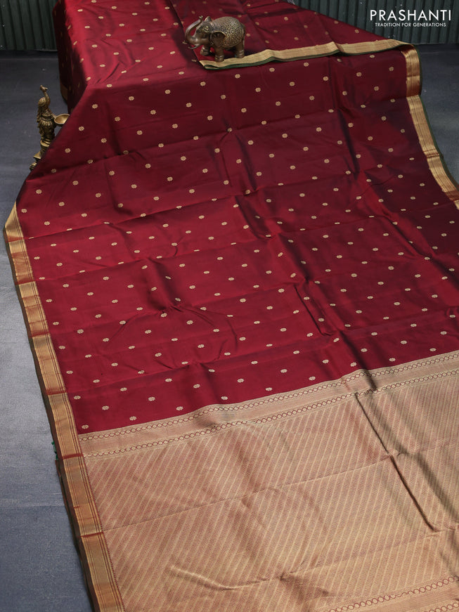 Pure kanchipuram silk saree deep maroon and dual shade of green with zari woven buttas and zari woven border