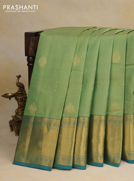 Pure kanchipuram silk saree pastel green and teal green with allover zari weaves & buttas and long zari woven border