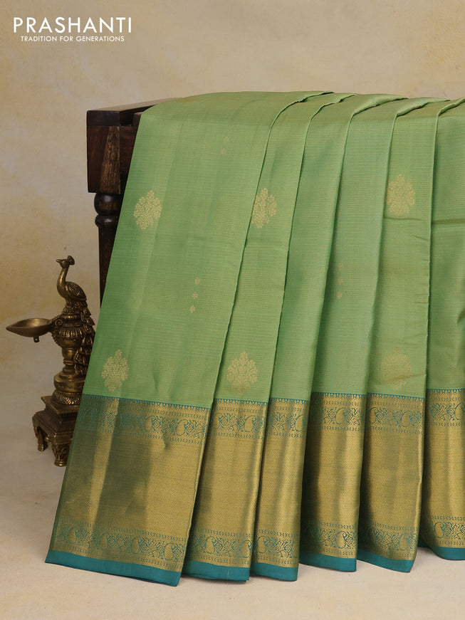 Pure kanchipuram silk saree pastel green and teal green with allover zari weaves & buttas and long zari woven border