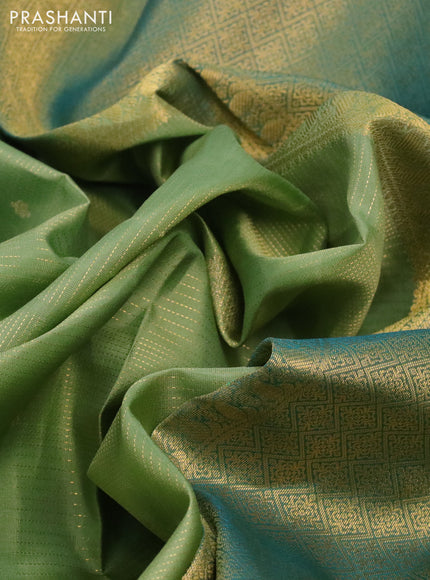 Pure kanchipuram silk saree pastel green and teal green with allover zari weaves & buttas and long zari woven border