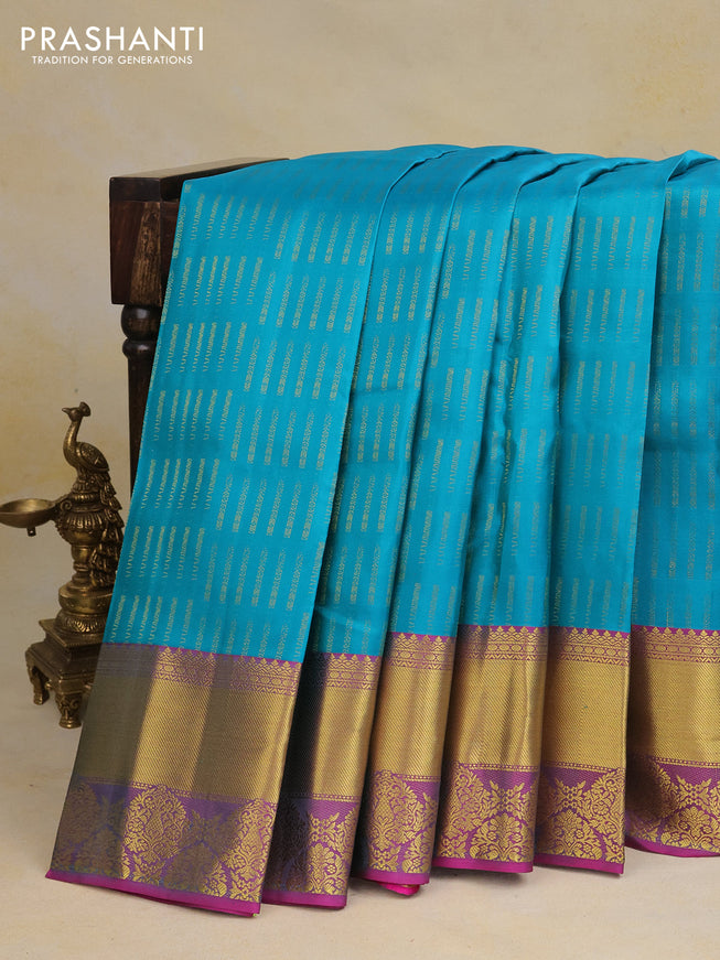 Pure kanchipuram silk saree teal blue and purple with allover zari woven butta weaves and rich zari woven border