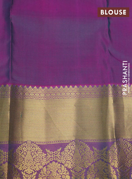 Pure kanchipuram silk saree teal blue and purple with allover zari woven butta weaves and rich zari woven border