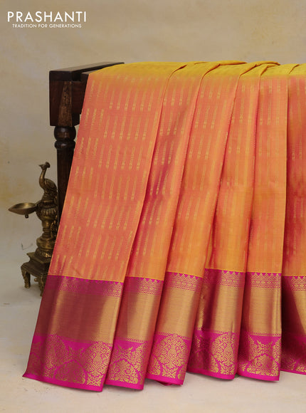 Pure kanchipuram silk saree dual shade of yellowish pink and pink with allover zari woven butta weaves and rich zari woven border