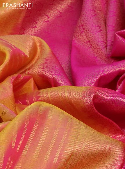 Pure kanchipuram silk saree dual shade of yellowish pink and pink with allover zari woven butta weaves and rich zari woven border