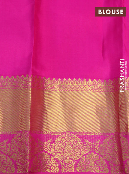 Pure kanchipuram silk saree dual shade of yellowish pink and pink with allover zari woven butta weaves and rich zari woven border