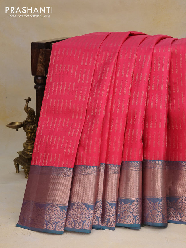 Pure kanchipuram silk saree peach pink and dual shade of teal green with allover zari woven butta weaves and rich zari woven border