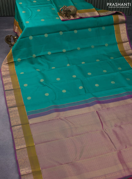 Pure kanchipuram silk saree teal green and purple with zari woven buttas and rich zari woven border