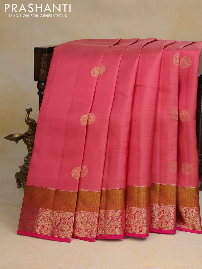 Pure kanchipuram silk saree peach pink shade and pink with allover zari woven buttas and rich zari woven border