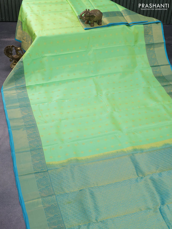 Pure kanchipuram silk saree light green and teal blue with zari woven buttas and annam zari woven border