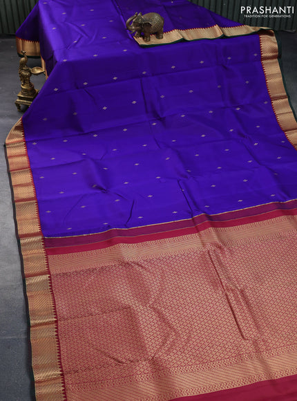 Pure kanchipuram silk saree blue and maroon with zari woven buttas and zari woven korvai border