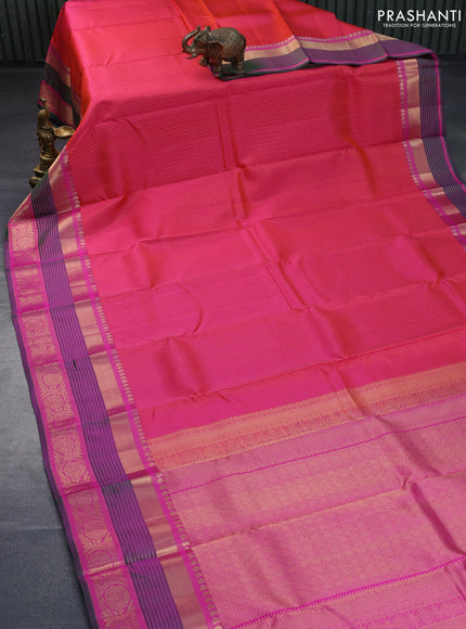 Pure kanchipuram silk saree dual shade of pinkish orange and pink with allover zari weaves and zari woven border