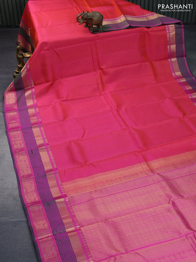 Pure kanchipuram silk saree dual shade of pinkish orange and pink with allover zari weaves and zari woven border