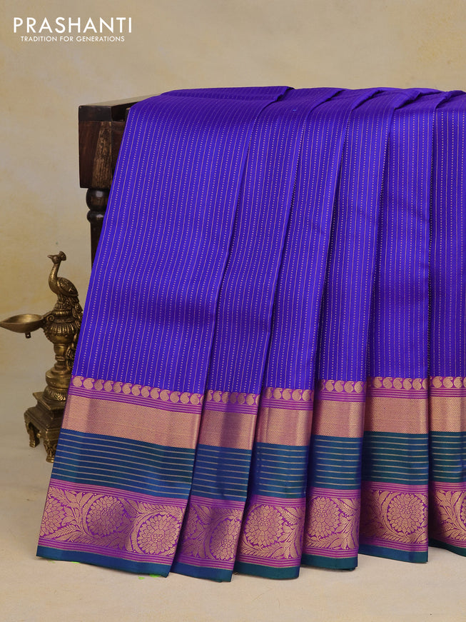 Pure kanchipuram silk saree blue and purple with allover zari weaves and zari woven border