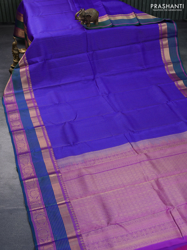 Pure kanchipuram silk saree blue and purple with allover zari weaves and zari woven border