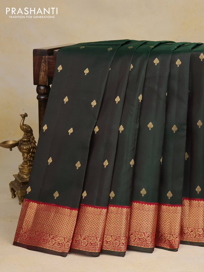 Pure kanchipuram silk saree dual shade of bottle green and maroon with zari woven buttas and zari woven korvai border