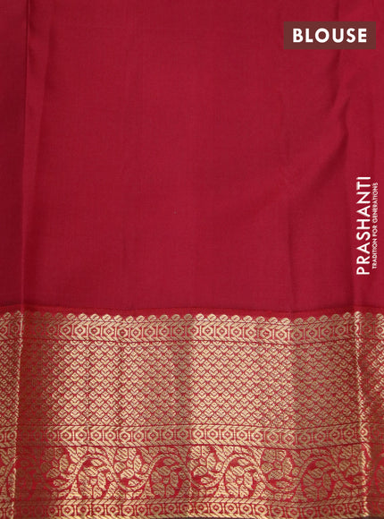 Pure kanchipuram silk saree dual shade of bottle green and maroon with zari woven buttas and zari woven korvai border