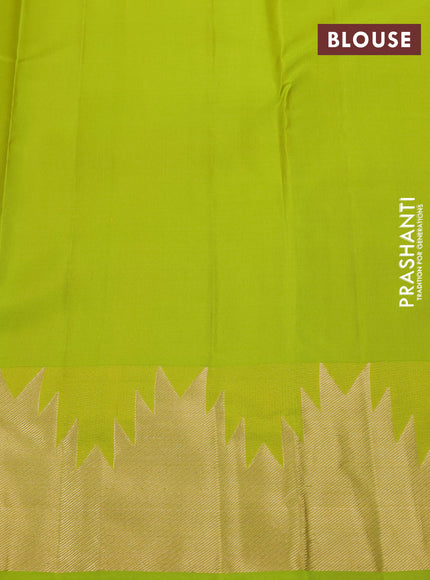 Pure kanchipuram silk saree flourescent green with plain body and temple zari woven border