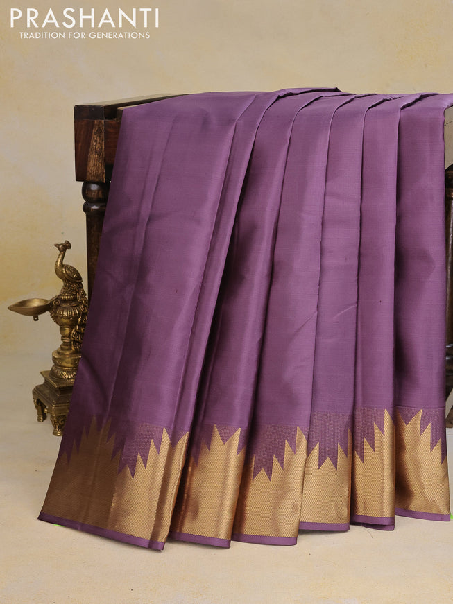 Pure kanchipuram silk saree pastel purple with plain body and temple zari woven border