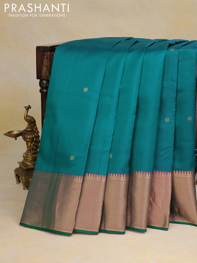 Pure kanchipuram silk saree peacock green and dual shade of purple with zari woven buttas and rich zari woven border