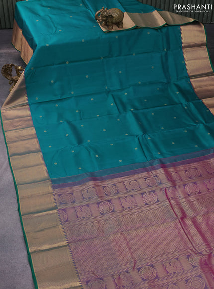 Pure kanchipuram silk saree peacock green and dual shade of purple with zari woven buttas and rich zari woven border