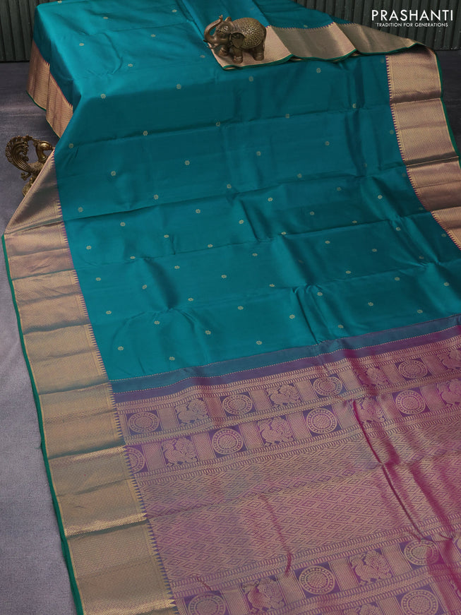 Pure kanchipuram silk saree peacock green and dual shade of purple with zari woven buttas and rich zari woven border