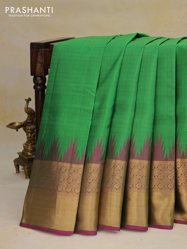 Pure kanchipuram silk saree green and purple with allover thread woven checked pattern and temple design zari woven border