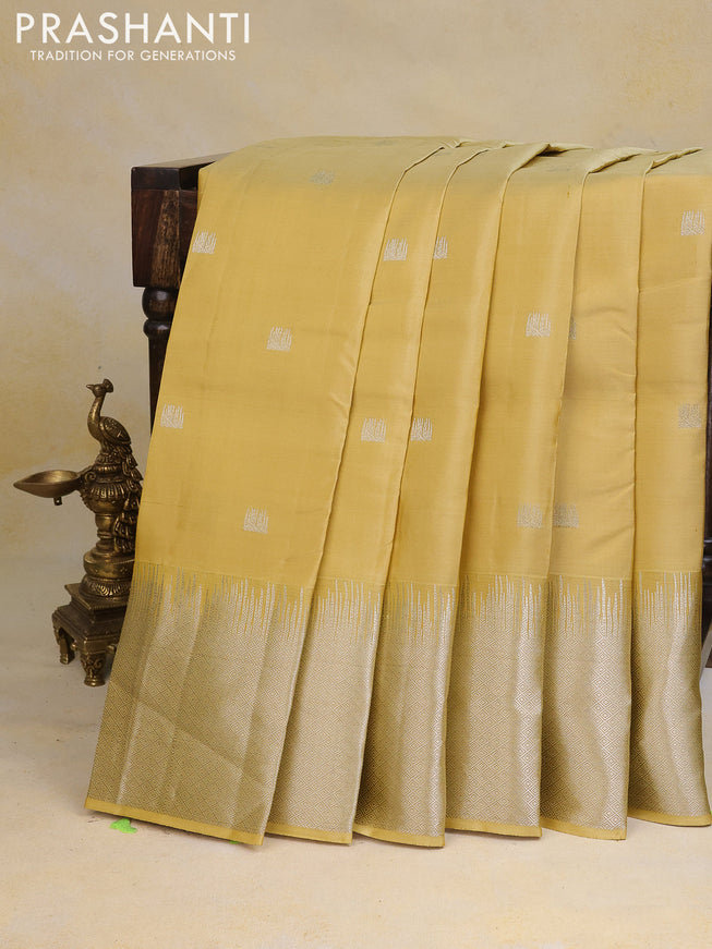 Pure kanchipuram silk saree pale yellow with silver zari woven buttas and silver zari woven border