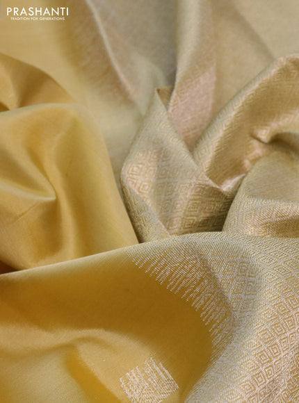 Pure kanchipuram silk saree pale yellow with silver zari woven buttas and silver zari woven border